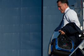 US Republican presidential candidate Mitt Romney walks off his plane on September 18, 2012 in Dallas where he will attend a fundraiser. AFP PHOTO/Nicholas KAMM