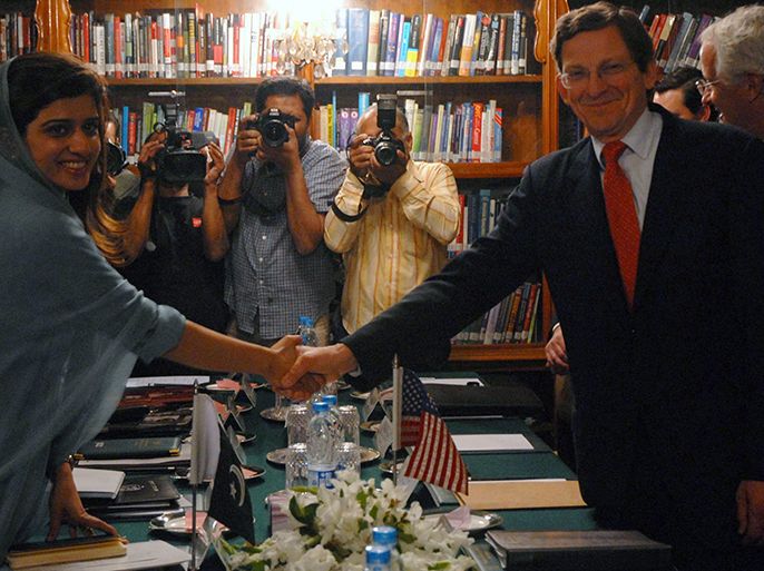 US special envoy for Pakistan-Afghanistan Marc Grossman (R) shakes hand with Pakistan's Foreign Minister Hina Rabbani Khar (L) ,during their meeting in Islamabad, Pakistan, 26 April 2012. Reports state that Marc Grossman arrived in Pakistan on 26 April to ease the relations between the two countries which were strained after the US military helicopters attack Pakistani military checkpost that killed some 24 of its soldiers last year. Pakistan's Parliament is considering a new law demanding an end to US drone attacks, an apology for November's border attack at Pakistani military post and a new framework for carrying supplies to Afghanistan. EPA