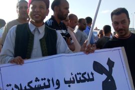الشارع الليبي يضغط لنزع سلاح المليشيات