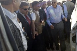 UN Syria peace envoy Lakhdar Brahimi arrives at the at Zaatri refugee camp, close to the northern Jordanian city of Mafraq, and home to some 30,000 Syrian fleeing the violence in their own country, on 18 September 2012. The envoy, who arrived in Jordan from Turkey, where he also visited refugees, met Syrian leader Bashar al-Assad for the first time on September 16, warning after the talks that the worsening conflict in Syria posed a threat to the region and the whole world. AFP PHOTO/KHALIL MAZRAAWI