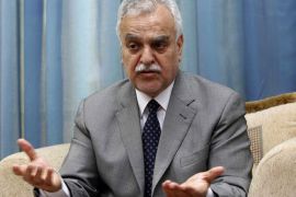 A picture taken on December 25, 2011 shows fugitive Iraqi vice president Tareq al-Hashemi speaking during an interview with AFP in Qalachwalan, 50 kms north of Sulaimaniyah. An Iraqi court sentenced Hashemi to death by hanging on charges of "terrorism"