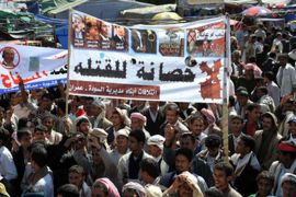 Yemeni anti-government protesters hold a banner reading in Arabic 'No immunity to killers' during a demonstration protesting against immunity from prosecution granted to outgoing Yemeni President Ali Abdullah Saleh in Sana'a, Yemen, 09 January 2012. According to media sources, the Yemeni government granted outgoing President Saleh and members of his inner circle immunity from prosecution in return for stepping down from power. The protesters demand the trial of Saleh and senior regime officials for the killing of hundreds of protesters since the anti-Saleh uprising began one year ago. EPA/YAHYA ARHAB
