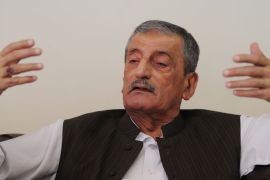 -, PAKISTAN : Ghulam Ahmed Bilour, Pakistan's Railways minister, speaks during an interview at his office in Islamabad on September 25, 2012. Bilour offered USD 100,000 for the death of a film-maker who produced an anti-Islam movie, and stood by the bounty, saying it was the "only way" to stop insults to the prophet Mohammed. Bilour sparked international condemnation when he offered the blood money and urged the Taliban and Al-Qaeda to carry out what he called the "noble deed". AFP