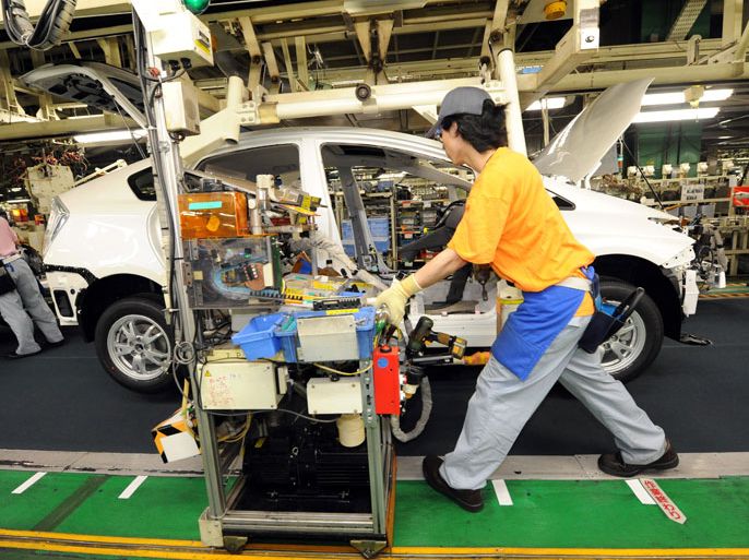 Japanese autoworkers assemble Toyota Motor Corp.'s third-generation hybrid 'Prius' cars at the automaker's Tsutsumi assembly plant in Toyota city, Aichi province, Japan, 05 June, 2009. Production lines are busy to fulfill orders for the hybrid car which went on sale in Europe in May. Approx. 50,000 cars are assembled monthly at the Tsutsumi plant. EPA/EVERETT KENNEDY BROWN