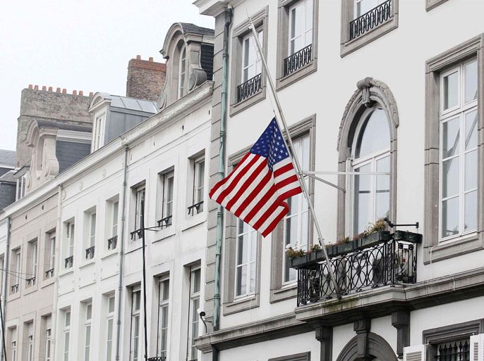 • Caption:A U.S. flag flies at half mast outside the U.S. embassy in Brussels March 16, 2012. Belgium said it would hold a national day of mourning on Friday for 22 children and six adults killed in a bus crash in Switzerland, as parents of the victims and the first of the survivors headed home.
