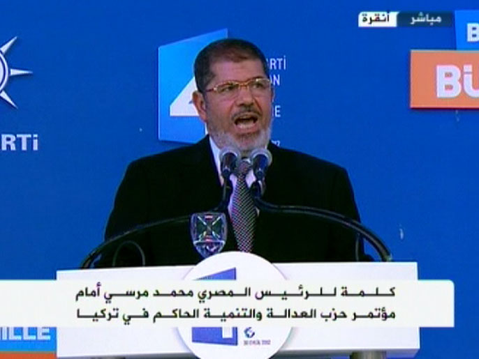 ‪مرسي قال إن بلاده لن تهدأ أو تستقر حتي يتوقف نزف الدم في سوريا‬ (الجزيرة)