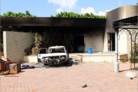 A burnt house and a car are seen inside the US Embassy compound on September 12, 2012 in Benghazi, Libya following an overnight attack on the building. The US ambassador to Libya and three of his colleagues were killed in an attack on the US consulate in the eastern Libyan city by Islamists outraged over an amateur American-made Internet video mocking Islam, less than six months after being appointed to his post. AFP PHOTO/STRINGER