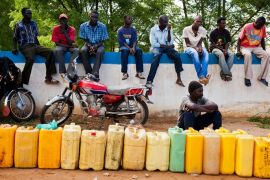• Caption:Men wait in line with their jerry cans at a gas station in Juba, May 14, 2012. South Sudan's citizens who paid in blood for their independence in a long liberation war are being told freedom carries its own price - in hardship. An oil shutdown from January by the former bush rebels who now run the world's newest nation has strangled the flow of dollars into an economy that produces almost nothing else, and sent the South Sudanese pound tumbling against the greenback. This has hiked the costs of everything from fuel to cooking oil, rice, charcoal and bananas. It is forcing the government to cut education and health spending in a state whose development indicators were already near the foot of world rankings. Picture taken May 14, 2012. To match Insight SOUTHSUDAN-ECONOMY.