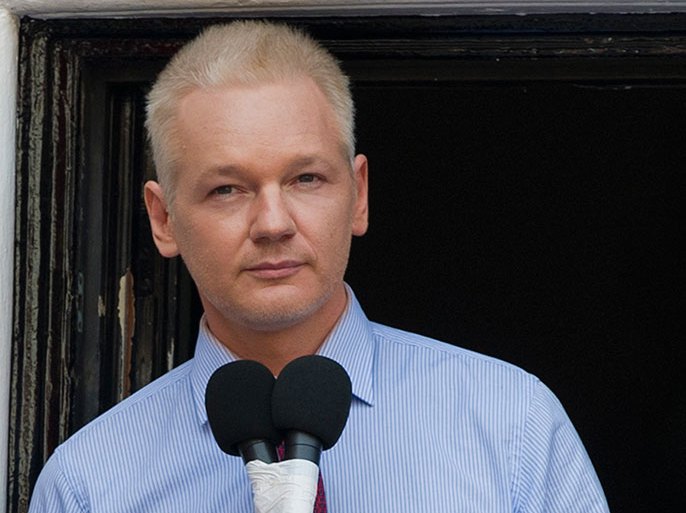 epa03365421 Wikileaks founder Julian Assange delivers a statement on the balcony inside the Ecuador Embassy where he has sought asylum in London, Britain, 19 August 2012. Tension has increased between Britain