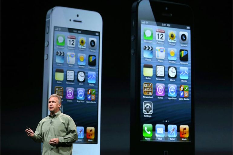 SAN FRANCISCO, CA - SEPTEMBER 12: Apple Senior Vice President of Worldwide product marketing Phil Schiller announces the new iPhone 5 during an Apple special event at the Yerba Buena Center for the Arts on September 12, 2012 in San Francisco, California. Apple announced the iPhone 5, the latest version of the popular smart phone. Justin Sullivan/Getty Images/AFP== FOR NEWSPAPERS, INTERNET, TELCOS &amp; TELEVISION USE ONLY ==