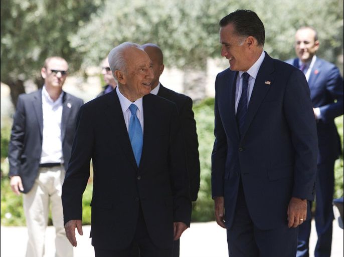 r: Israel's President Shimon Peres (L) and U.S. Republican presidential candidate Mitt Romney smile at each other upon Romney's arrival for their meeting in Jerusalem July 29, 2012. Romney would back Israel if it were to decide it had to use military force to stop Iran from developing a nuclear weapon, a senior aide said on Sunday. REUTERS/Ronen Zvulun (JERUSALEM - Tags: POLITICS)