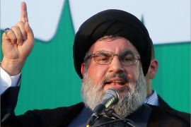 Lebanon's Hezbollah chief Hassan Nasrallah addresses thousands of supporters who took to the streets of southern Beirut to denounce a film mocking Islam on September 17, 2012. Nasrallah, who made a rare public appearance, has called for a week of protests across the country over the low-budget, US-made film, describing it as the "worst attack ever on Islam." AFP PHOTO / JOSEPH EID