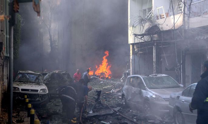 Lebanese firefighters extinguish a fire at the scene of a car bomb explosion in Beirut's Christian neighbourhood of Ashrafieh on October 19, 2012. A car bomb attack left dead and wounded in mainly Christian east Beirut, in the first such attack in the Lebanese capital since 2008, the National News Agency reported