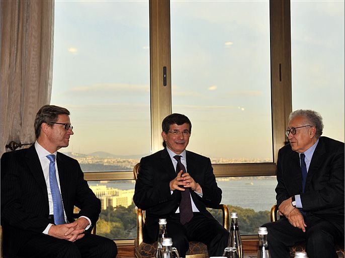 (L-R) German Foreign Minister Guido Westerwelle, Turkish Foreign Minister Ahmet Davutoglu and International peace envoy to Syria Lakhdar Brahimi talk on October 13, 2012 at the Hilton Hotel in Istanbul. Peace envoy Lakhdar Brahimi and German Foreign Minister Guido Westerwelle were in Istanbul for talks with Turkish leaders today as tensions soared between Damascus and Ankara over cargo seized from a Syrian passenger plane. AFP PHOTO/BULENT KILIC