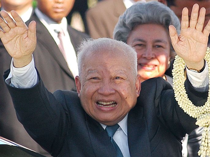 (FILE) Cambodia's former King Norodom Sihanouk (C), his wife Norodom Monineath (R), arrive at The Phnom Penh International Airport, Cambodia, Friday 26 May 2006. Cambodian former King Norodom Sihanouk, who abdicated the throne in favor of his son in 2004, died on 15 October 2012 in Beijing, China, at the age of 89, according to media reports. EPA/MAK REMISSA