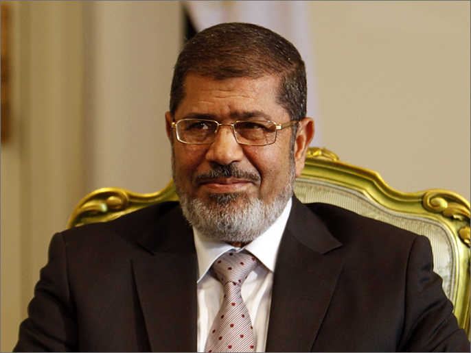 ‪‬ مرسي تدخل في القضية من أجل إطلاق سراح الطفلين(رويترز-أرشيف)