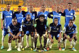 Team members of Sudan's al-Hilal club pose for a group photograph prior to their match against Sudan's el-Merreikh club during their CAF Confederation Cup footeball match at the Merreikh Stadium in the Sudanese capital Khartoum, on October 20, 2012. AFP PHOTO/EBRAHIM HAMID