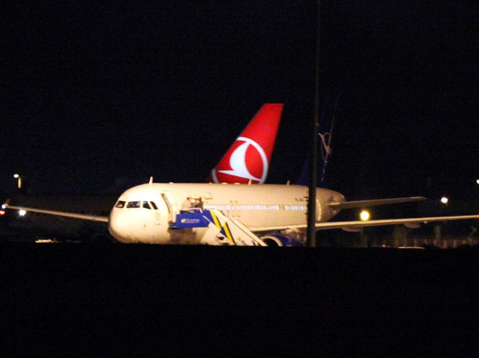 A Syrian passenger plane is seen after it was forced to land at Ankara airport on October 10, 2012. A Syrian passenger plane was forced to land in Ankara on Wednesday evening on suspicions that it was carrying weapons, Anatolia news agency reported citing officials. AFP PHOTO/ADEM ALTAN