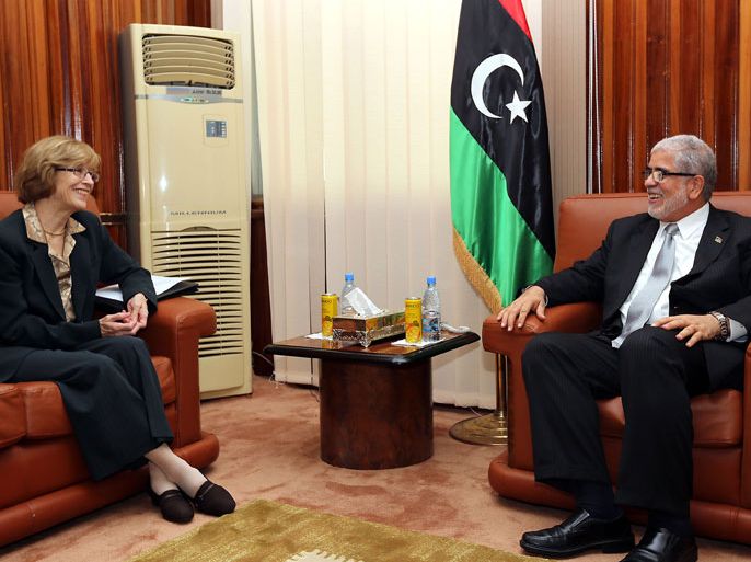 US Assistant Secretary of State for Near East Affairs Beth Jones (L) shares a laugh with Libyan Prime Minister Mustafa Abu Shagur during a meeting in Tripoli on October 2, 2012. Libyan authorities have approved an FBI visit to Benghazi following a deadly attack on the US mission there, but details of cooperation still need to be ironed out, a senior official said. AFP PHOTO/MAHMUD TURKIA