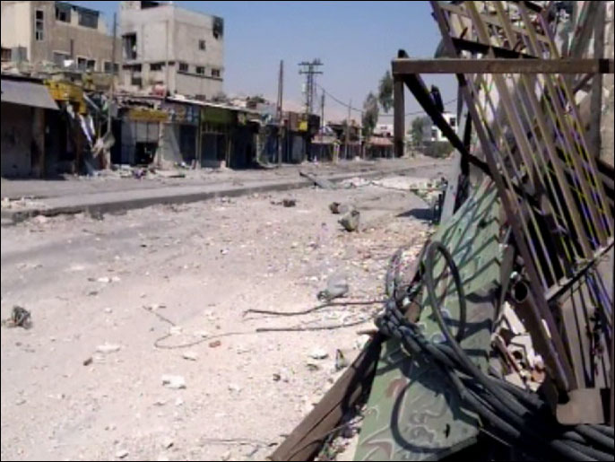 ‪ثار الدمار جراء القصف على أحياء دمشق‬ (الجزيرة)