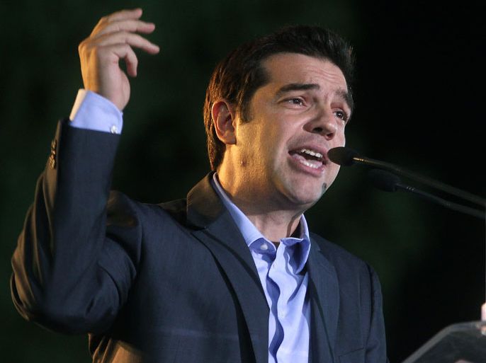 epa03423861 Main opposition SYRIZA party leader Alexis Tsipras delivers a speech at SYRIZA's Youth Festival in Athens, Greece, 06 October 2012. 'Europe was and remains our strategic choice,' Alexis Tsipras said, adding that 'Europe is being led into stagnation and dissolution because of neo-liberal policies'.SYRIZA stressed that mobilisations during a visit of German Chancellor Angela Merkel will be supported decisively and called on workers, the unemployed and the young people to participate in a strike action, called by the trade unions in Athens’ downtown Syntagma Square on Tuesday. EPA/SIMELA PANTZARTZI