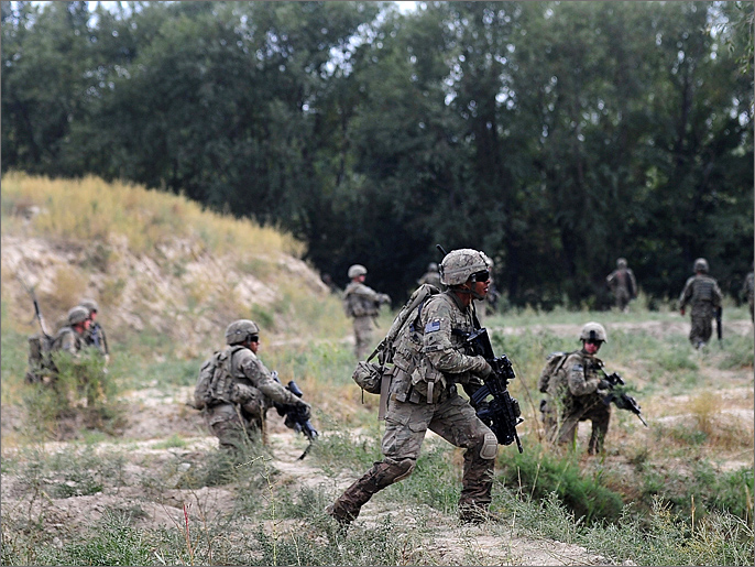 ‪مع نهاية 2015 سيتقلص عدد القوات الأميركية بأفغانستان إلى قرابة خمسة آلاف‬ (الفرنسية)