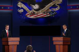 Debate moderator Jim Lehrer (C) speaks to Democratic presidential candidate, U.S. President Barack Obama (R) and Republican presidential candidate, former Massachusetts Gov. Mitt Romney (L) during the Presidential Debate at the University of Denver on October 3, 2012 in Denver, Colorado. The first of four debates for the 2012 Election, three Presidential and one Vice Presidential, is moderated by PBS's Jim Lehrer and focuses on domestic issues: the economy, health care, and the role of government. Win McNamee/Getty Images/AFP== FOR NEWSPAPERS, INTERNET, TELCOS & TELEVISION USE ONLY ==