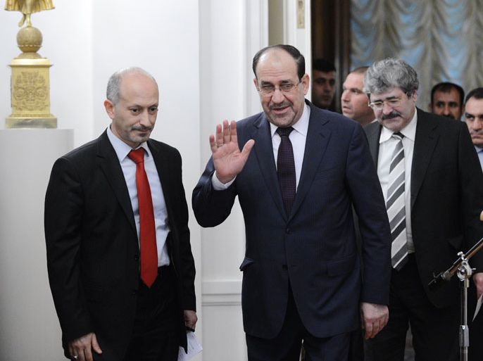 Iraqi Prime Minister Nuri al-Maliki waves before delivering a speach at the Ministry of Foreign affairs in Moscow on October 8, 2012. Maliki arrived in Moscow for three days of discussions monday that media reports speculated would conclude with the signature of a $4.3 billion arms deal that makes Russia Iraq's biggest supplier after the United States. AFP
