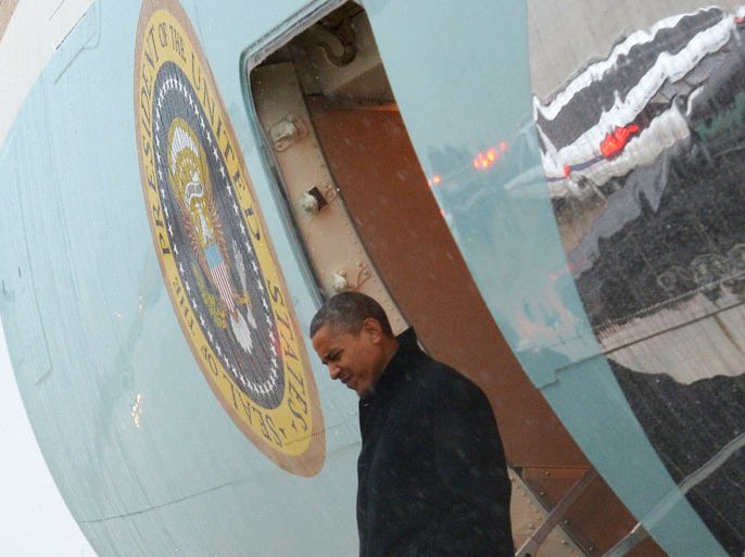 US President Barack Obama steps off Air Force One October 29, 2012 upon arrival at Andrews Air Force Base in Maryland. Obama cancelled his appearance at a campaign rally in Orlando, Florida and returned early to Washington, DC to monitor response to Hurricane Sandy. Much of the eastern United States was in lockdown mode October 29, 2012 awaiting the arrival of a hurricane dubbed "Frankenstorm" that threatened to wreak havoc on the area with storm surges, driving rain and devastating winds.
