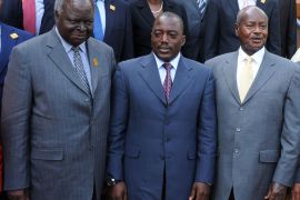 (L-R) Kenya's President Mwai Kibaki, President of the Democratic Republic of Congo Joseph Kabila and Uganda's President Yoweri Museveni pose in Kampala on November 24, 2012 as they attend an extraordinary summit of the 11-member regional bloc, the International Conference on the Great Lakes Region (ICGLR). Regional leaders called on DR Congo rebel group M23 today to end hostilities and relinquish a key eastern town it seized in an advance that has sparked fears of a wider conflict.