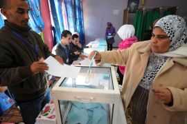 An Algerian woman casts her vote at a polling station in Algiers during local elections on November 29, 2012. Algeria's ruling party is eyeing a landslide victory in local elections, with numerous opposition groups warning of fraud in a poll that could struggle to mobilise a disaffected electorate