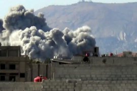Damascus, -, SYRIA : An image grab taken from a video uploaded on YouTube on October 29, 2012, allegedly shows smoke billowing from buildings following shelling by forces loyal to Syrian President Bashar al-Assad on east Ghouta, near the capital Damascus. Clashes erupted between Syrian rebels and troops backed by Palestinian fighters near Damascus on Octboer 30, as the UN-Arab League peace envoy was due in China in a bid to revive struggling efforts to halt the violence. AFP PHOTO/YOUTUBE == RESTRICTED TO EDITORIAL USE - MANDATORY CREDIT "AFP PHOTO/YOUTUBE" - NO MARKETING NO ADVERTISING CAMPAIGNS - DISTRIBUTED AS A SERVICE TO CLIENTS - AFP IS USING PICTURES FROM ALTERNATIVE SOURCES AS IT WAS NOT AUTHORISED TO COVER THIS EVENT, THEREFORE IT IS NOT RESPONSIBLE FOR ANY DIGITAL ALTERATIONS TO THE PICTURE'S EDITORIAL CONTENT, DATE AND LOCATION WHICH CANNOT BE INDEPENDENTLY VERIFIED ==