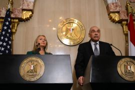 Egyptian Foreign Minister Mohammed Kamel Amr (R) and US Secretary of State Hillary Clinton give a statement after their meeting with President Mohamed Morsi in the presidential palace in Cairo on November 21, 2012. Amr announced that a truce had been agreed between Israel and Hamas to end a week of bloodshed in and around Gaza and said a ceasefire would take effect at 1900 GMT