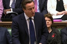 Britain's Prime Minister David Cameron, flanked by Deputy Prime Minister Nick Clegg (L), Culture Secretary Maria Miller (2ndR) and Business Secretary Vince Cable (R), speaks about Lord Justice Brian Leveson's report on media practices in Parliament in this still image taken from video in London November 29, 2012. Cameron rejected the idea of a law to regulate the British