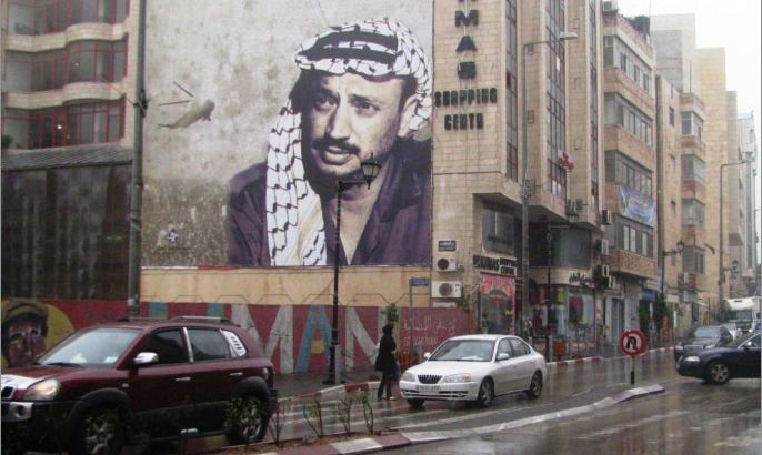 صورة ياسر عرفات على حائط