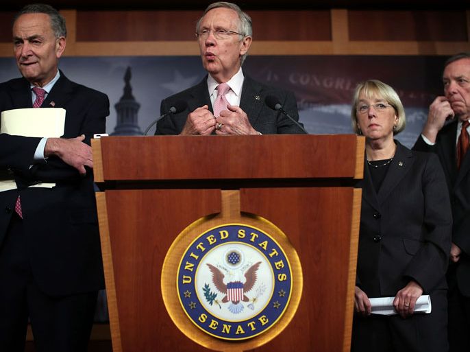 Washington, District of Columbia, UNITED STATES : WASHINGTON, DC - NOVEMBER 29: U.S. Senate Majority Leader Sen. Harry Reid (D-NV) (2nd L) speaks as (L-R) Sen. Charles Schumer (D-NY), Sen. Patty Murray (D-WA) and Senate Majority Whip Sen. Richard Durbin (D-IL) listen during a news conference November 29, 2012 on Capitol Hill in Washington, DC. The Democratic Senate leaders held a news conference to discuss the fiscal cliff issue and the meeting Reid had with Secretary of Treasury Timothy Geithner earlier. Alex Wong/Getty Images/AFP== FOR NEWSPAPERS, INTERNET, TELCOS & TELEVISION USE ONLY ==