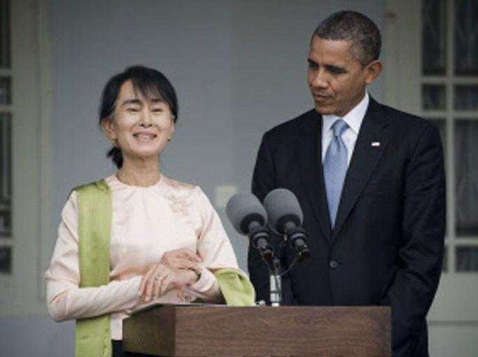 ASF319 - Yangon, -, MYANMAR : US President Barack Obama (R) and Myanmar pro-democracy leader Aung San Suu Kyi (L) hold a brief joint press conference at her residence in Yangon, on November 19, 2012. Obama arrived in Myanmar for a historic visit aimed at encouraging a string of dramatic political reforms in the former pariah state. AFP PHOTO/ Nicolas ASFOURI