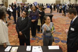 epa03368326 Unemployed workers Edward Hernandez (2-L) and Magda Meyer (2-R) speak with Centers for Disease Control and Prevention recruiters Marietta Newman (L) and Jerry Johnson at the Atlanta Bilingual Professional Job Fair in Decatur, Georgia, USA, 23 August 2012. Applications for first-time unemployment benefits were up slightly according to the US Department of Labor. EPA/ERIK S. LESSER