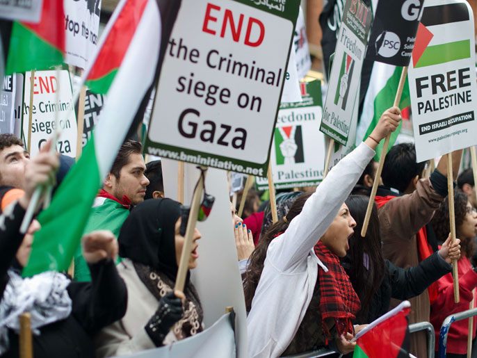 Pro-Palestinian demonstrators protest near the Israeli embassy in central London on November 17, 2012, over the continuing airstrikes by Israeli forces on the Gaza Strip. Hundreds of protesters crowded outside the Israeli embassy to shout slogans as airstrikes added to the toll of Palestinian dead in the Gaza Strip. Israeli strikes on Gaza killed 10 Palestinians and destroyed the Hamas government headquarters on November 17 as Israel called up thousands more reservists for a possible ground war. After Palestinian militants fired rockets at the heart of Israel on Friday, Israeli warplanes carried out 180 air strikes overnight.