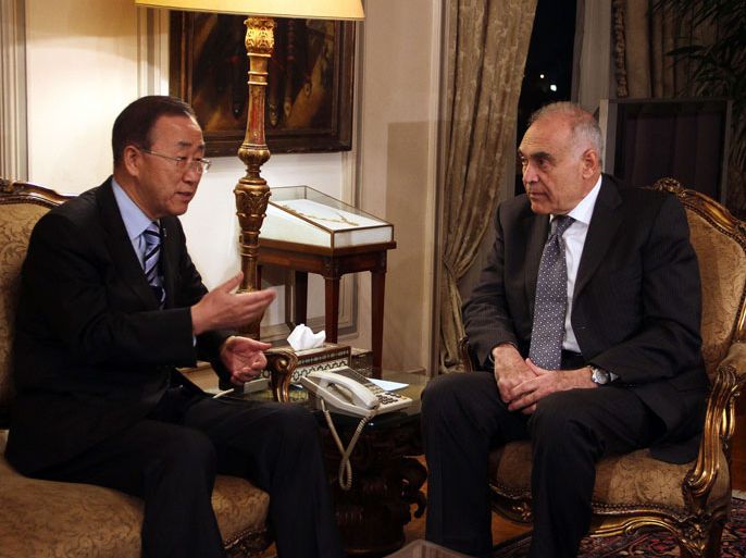 United Nations Secretary General Ban Ki-moon (L) talks with the Egyptian Foreign Minister Mohamed Kamel Amr (R) during their meeting on November 19, 2012 in Cairo. UN chief Ban Ki-moon arrived in Cairo Monday on the first leg of a visit to support Egyptian-mediated efforts for a ceasefire between Israel and Hamas in Gaza