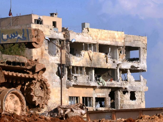 A general view shows a heavily damaged building in the al-Layramun district of the northern city of Aleppo, which is under government troops control, on November 26, 2012. Syrian rebels aiming to encircle Aleppo virtually cut off roads to the city from neighbouring Raqa province as the army targeted rebel strongholds around Damascus