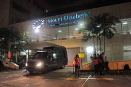 ROS1244 - Singapore, -, SINGAPORE : A police morgue vehicle is parked in front of the Mount Elizabeth hospital in Singapore on December 29, 2012, to retrieve the dead body of the Indian gang-rape victim. The 23-year-old woman died Saturday in Singapore after suffering severe organ failure,