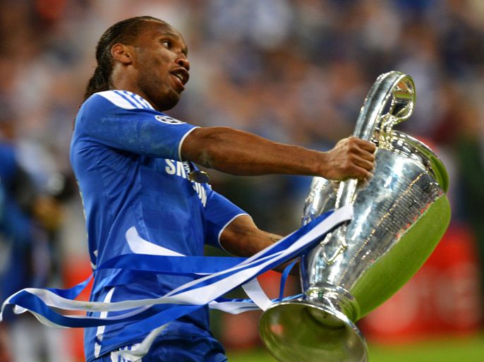 epa03227223 Chelsea's Didier Drogba celebrates after the team won the UEFA Champions League soccer final between FC Bayern Munich and Chelsea FC in Munich, Germany, 19 May 2012. Chelsea won 4-3 in penalty shoot out. EPA/MARCUS BRANDT