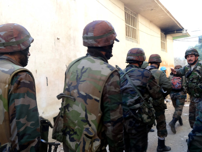 ‪القوات النظامية أعدمت عشرات في حي دير بعلبة بحمص حسب ناشطين‬ (الأوروبية)