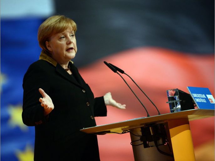 German Chancellor Angela Merkel gives a speech during a congress of Germany's ruling conservative Christian Democratic Union (CDU) party on December 4, 2012 in Hanover, central Germany. Germany's Angela Merkel will rally the rank-and-file of her conservative party at its annual congress running until December 5, eyeing a third term as chancellor of Europe's top economy in elections in the year 2013. AFP HOTO / JOHANNES EISELE