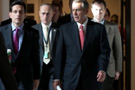 Washington, District of Columbia, UNITED STATES : WASHINGTON, DC - DECEMBER 21: Speaker of the House John Boehner (R-OH) (2nd R) walks to a press conference with House Majority Leader Eric Cantor (R-VA) (L) at the U.S. Capitol December 21, 2012 in Washington, DC. House Republicans could not agree to support Boehner's proposed "Plan B" initiative yesterday and now must find a new way to reach agreement with U.S. President Barack Obama on a deficit reduction deal. Win McNamee/Getty Images/AFP== FOR NEWSPAPERS, INTERNET, TELCOS & TELEVISION USE ONLY ==
