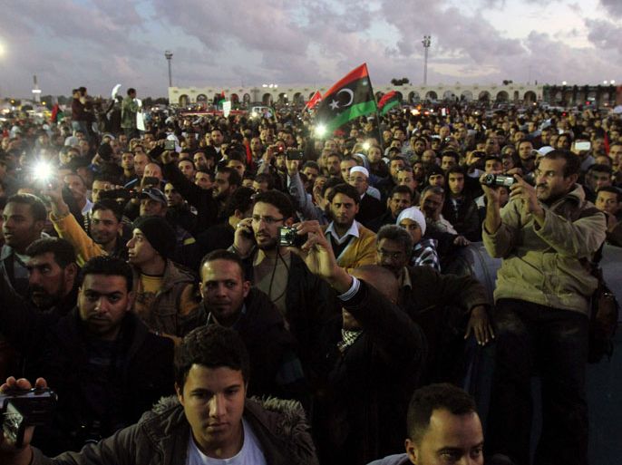 Libyan protesters gather for a demonstration in the eastern city of Benghazi on December 28, 2012 to demand that militias made up of former rebels who helped oust dictator Moamer Kadhafi disband and join the army and police. AFP PHOTO/ABDULLAH DOMA
