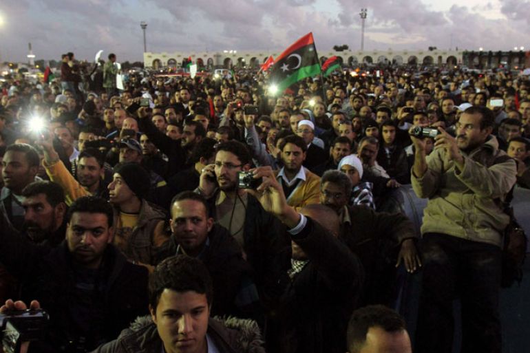 Libyan protesters gather for a demonstration in the eastern city of Benghazi on December 28, 2012 to demand that militias made up of former rebels who helped oust dictator Moamer Kadhafi disband and join the army and police. AFP PHOTO/ABDULLAH DOMA