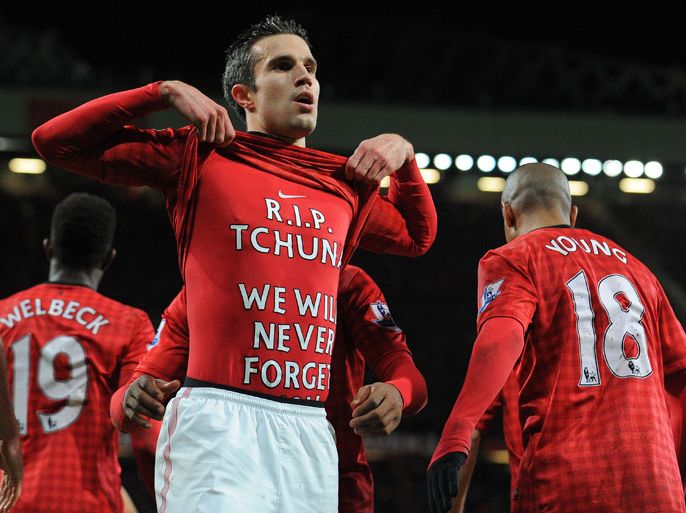 Manchester, Greater Manchester, UNITED KINGDOM : Manchester United's Dutch forward Robin van Persie celebrates after scoring his team's second goal during the English Premier League football match between Manchester United and West Bromwich Albion at Old Trafford in Manchester, north-west England on December 29, 2012. AFP PHOTO/ANDREW YATES