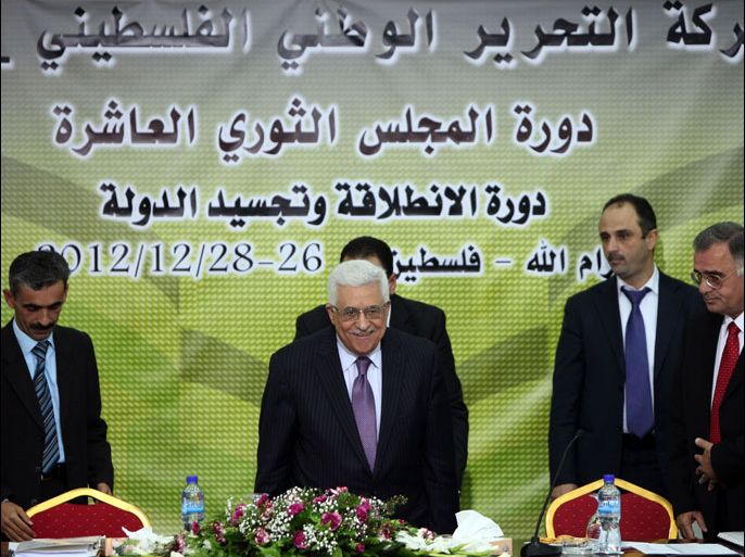Palestinian Authority president and head of the Fatah movement Mahmud Abbas arrives to attend a Fatah "Revolutionary Council" meeting in the Palestinian West Bank city of Ramallah along with top officials, on December 26, 2012. AFP PHOTO / ABBAS MOMANI